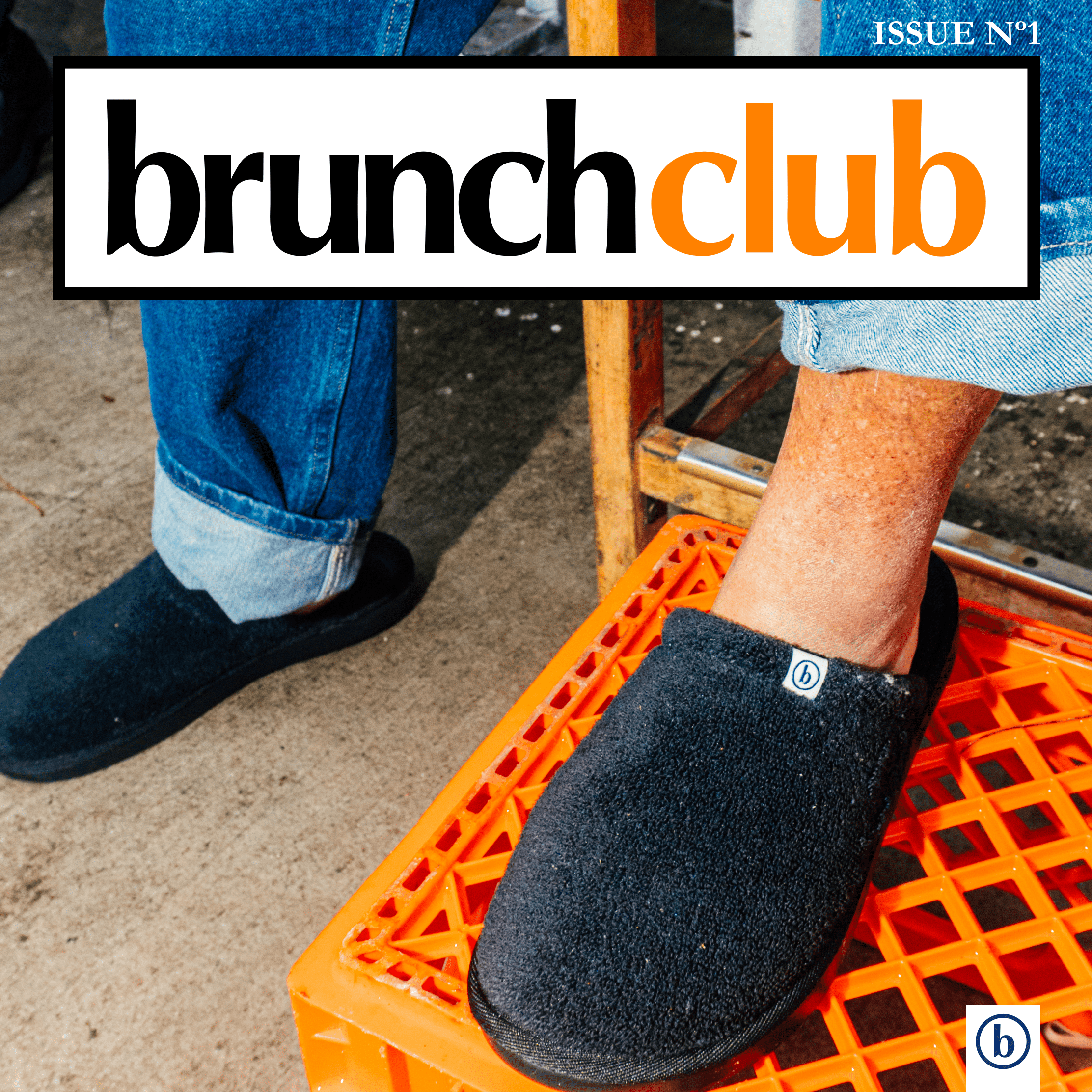 Close-up of black slippers on an orange crate with brunchclub masthead and Issue No 1