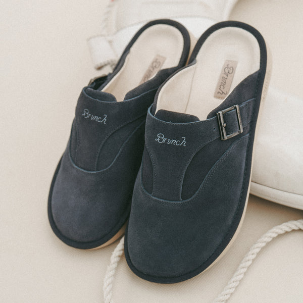 Charcoal suede slip-on clogs with side buckle and embroidered Brunch on the vamp, cream insole and rope prop