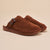 Brown suede slip-on slippers with buckle, shearling lining and Brunch logo on sole and upper