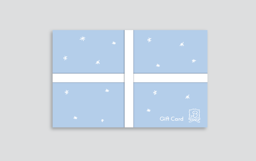 Blue gift card with white stars on a gray background
