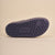 Navy rubber shoe sole showing Brunch logo and circular B stamp in the tread pattern