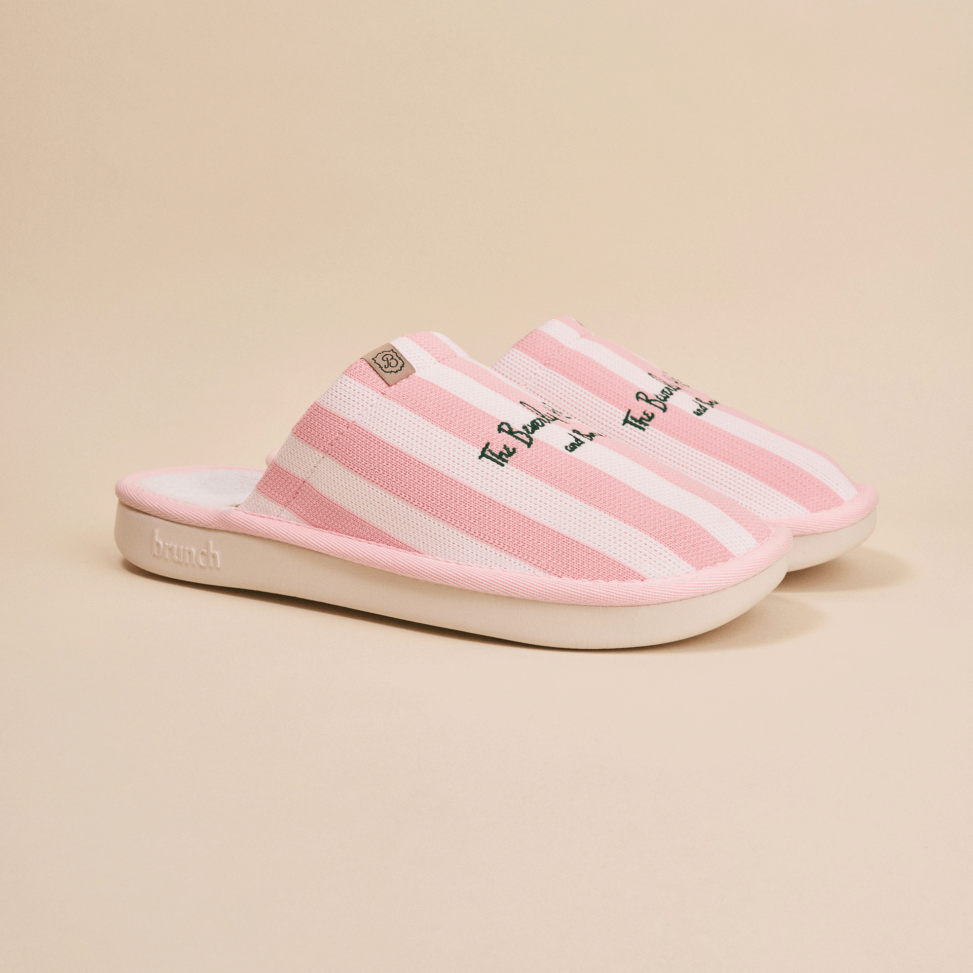 Pink-and-white striped slip-on slippers with embroidered script, small 'B' tag and 'brunch' embossed on sole