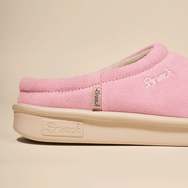 Pink suede slip-on slipper with Brunch embroidered on upper and embossed on cream sole