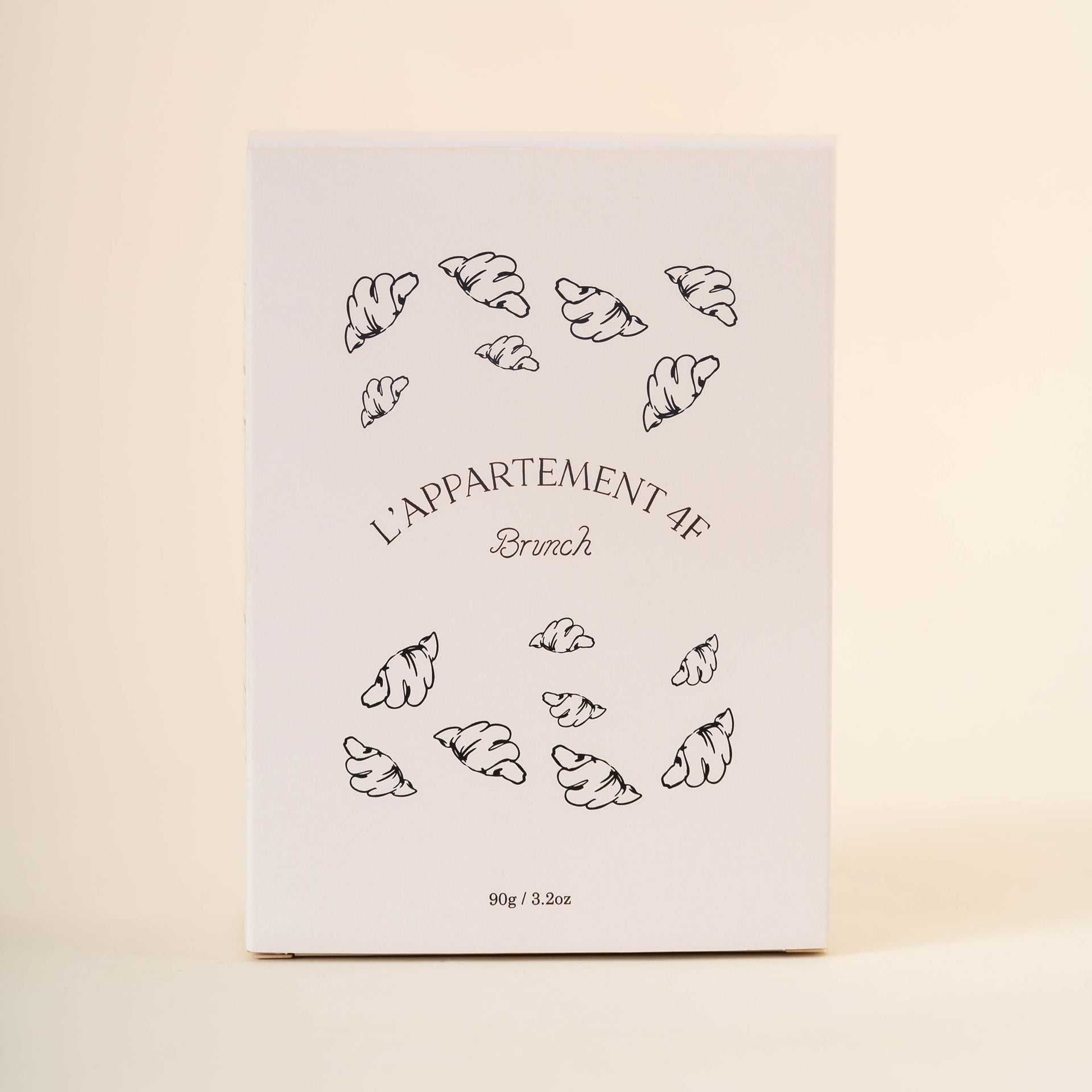 White product box with croissant illustrations and text 'L'APPARTEMENT 4F Brunch 90g / 3.2oz'.