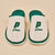 Pair of white cable-knit slip-on slippers with green trim, embroidered 'p' above 'prince' on each upper