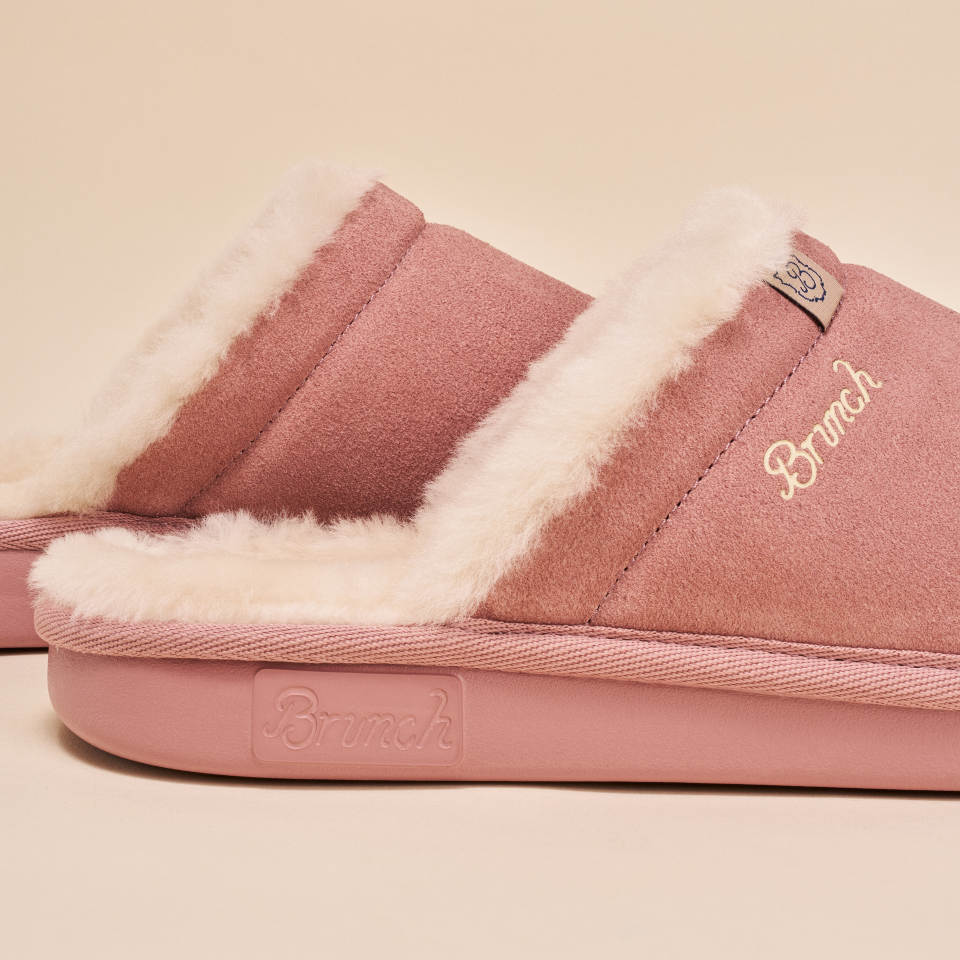 Mauve pink shearling-lined slip-on slipper with 'Brunch' logo embroidered on side and embossed on sole