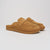 Three-quarter view of honey suede Loafer showcasing open-back mule, cushioned footbed and gum EVA outsole on light gray background