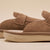 Suede tan slide with adjustable strap; close-up showing brunch embossed on the sole
