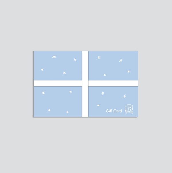 Front view of Brunch gift card with light blue wrap, white ribbon and scattered white star accents on light gray background