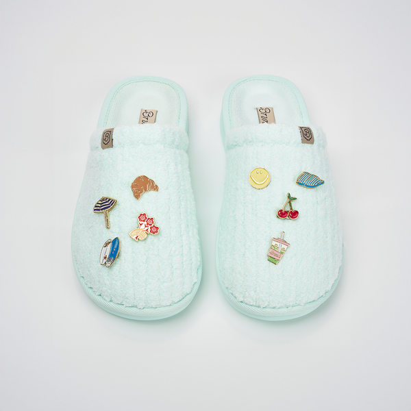 Top view of Lido Essential Ribbed Terry slippers in aqua showing ribbed terry texture and magnetic charms on a white background