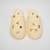 Top-down view of Limoncello Essential ribbed terry slippers showcasing magnetic charms on white background