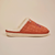 Side view of Essential Eggo slipper in syrup with waffle-embossed suede upper, shearling lining and cream outsole on neutral background
