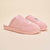 Three-quarter view of pink Essential Hello Kitty terry slippers with Hello Kitty embroidery on plush upper