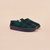 Angled side view of Essential Kids slipper showcasing navy and green plaid recycled polyester upper and navy EVA outsole on pale beige background
