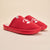 Three-quarter view of Essential Parke crimson fleece slippers showcasing white embroidered hearts and Parke script on a neutral beige background
