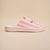 Side view of pink striped Essential slipper with 'Beverly Hills Hotel' embroidery on upper, white sole on beige background