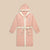 Front view of pink hooded robe with Hello Kitty embroidery, contrast cream trim, pockets, and belt on beige background