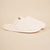 Side view of Brunch Essential slipper showcasing cream terry upper and cushioned white sole on beige background
