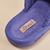 Close-up of Essential slipper interior showcasing purple terry lining, stitched ‘Brunch’ label and embossed ‘brunch’ logo on beige background