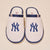 Top view of a pair of cream terry slip-on slippers showcasing embroidered navy Yankees NY logo and navy trim on a light background