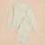Flat lay of cream Hello Kitty cotton pajamas, long-sleeve button top and elastic-waist pants on pale pink background