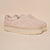 Angled view of Puff XXL slipper in beige terry with thick platform outsole on beige background