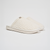 Angled side view of The Essential slipper in Panna ribbed terry showing plush ribbed upper and EVA outsole on white background
