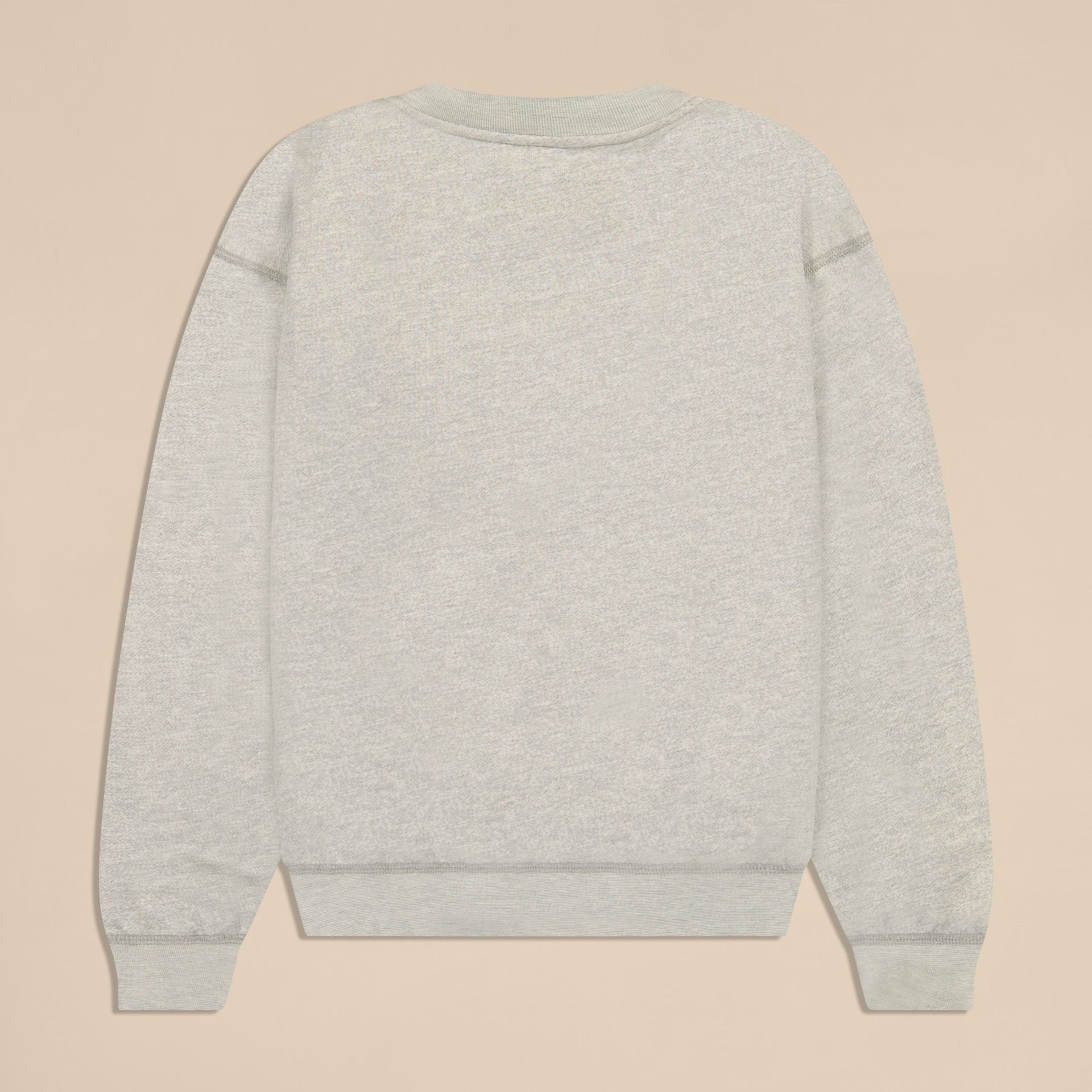 Back view of Varsity Crewneck in heather grey, showing French terry texture and ribbed cuffs and hem on beige background