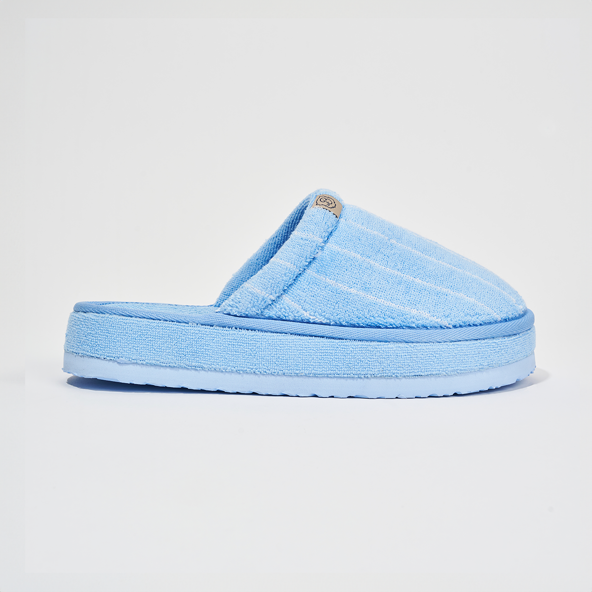 Side view of Essential XXL slipper with 100 percent cotton blue-and-white striped terry upper and platform sole on white